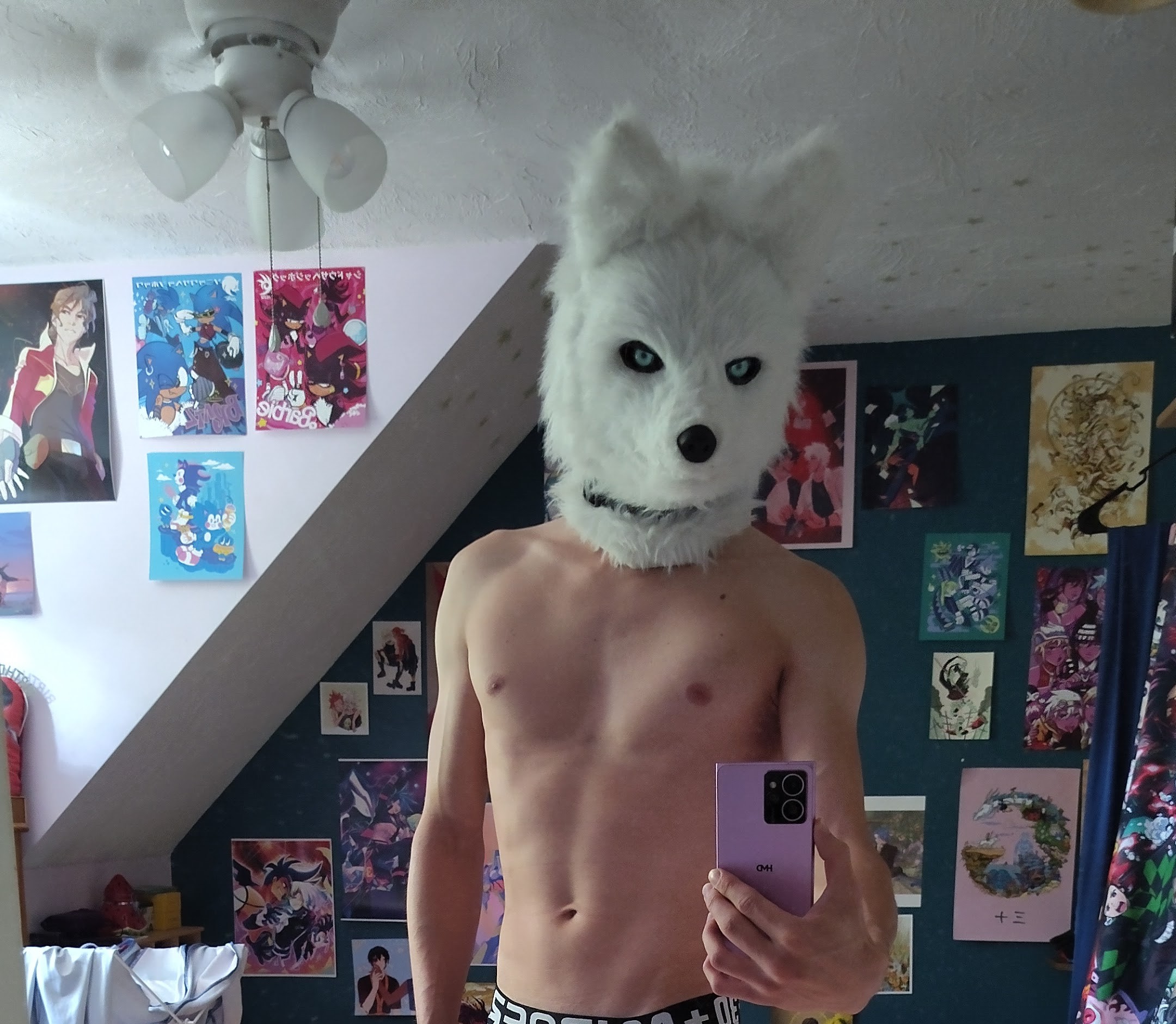 Me wearing the head partial of my arctic fox sona Kokaku in my bedroom. Tastefully cropped